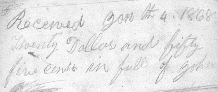 Written receipt in front of the book