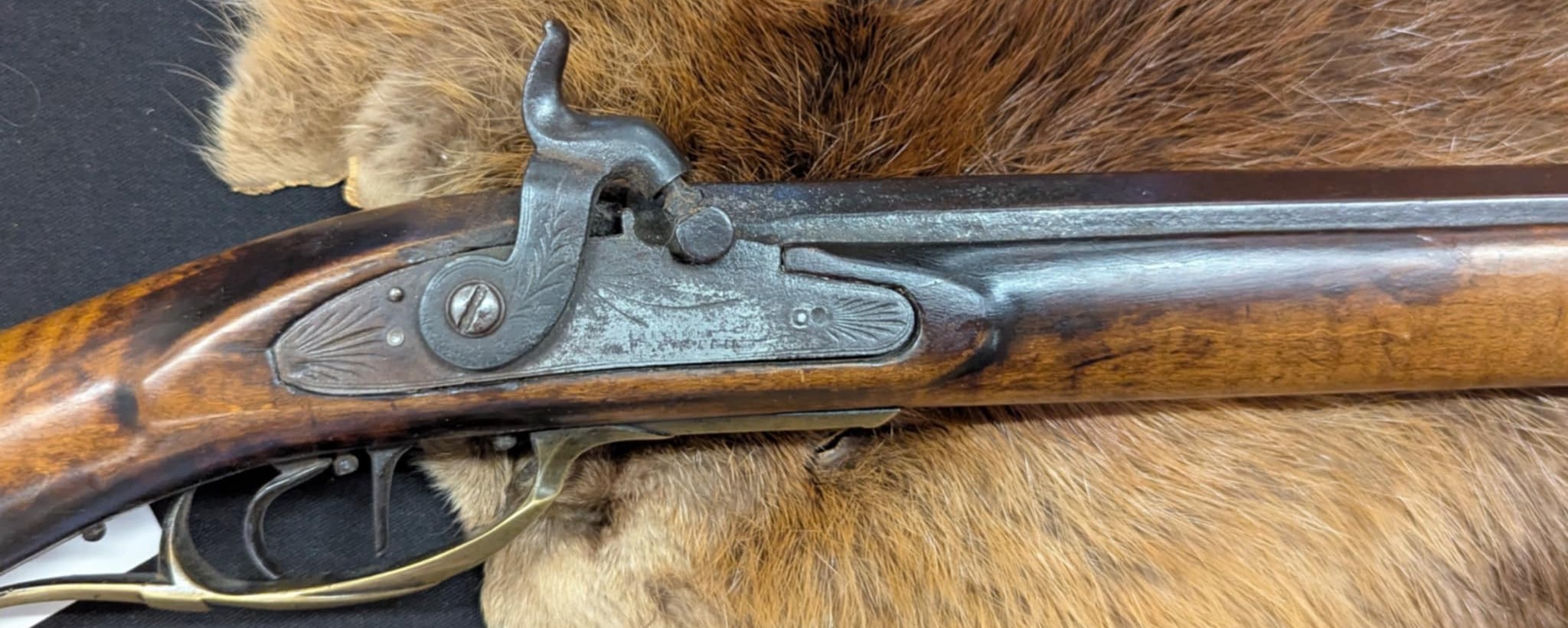 Full stock Jacob Mier black powder rifle.