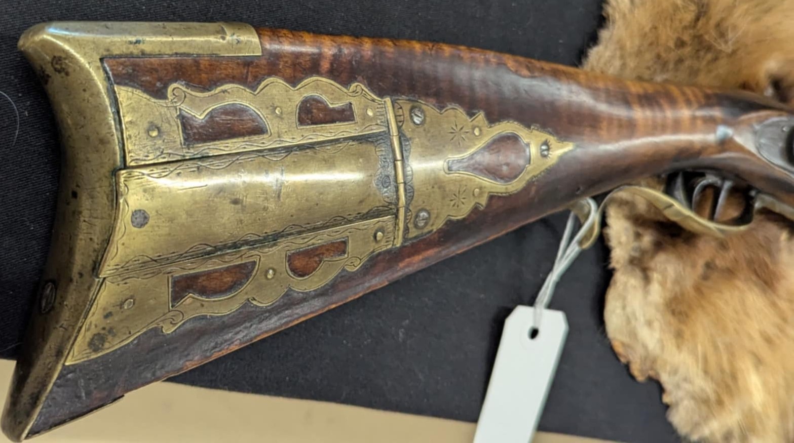 Full stock Jacob Mier black powder rifle.